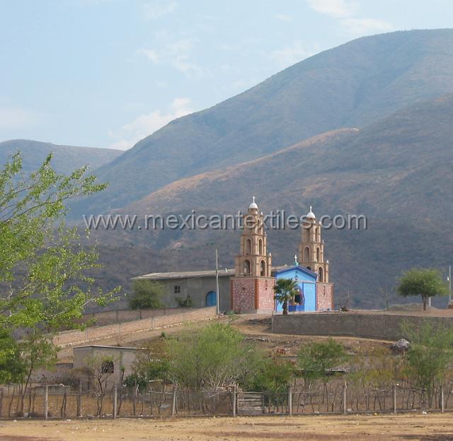 Tetelcingo_b.JPG - One of the other churches in town, behind are the deforested hills which lead down to the river below.